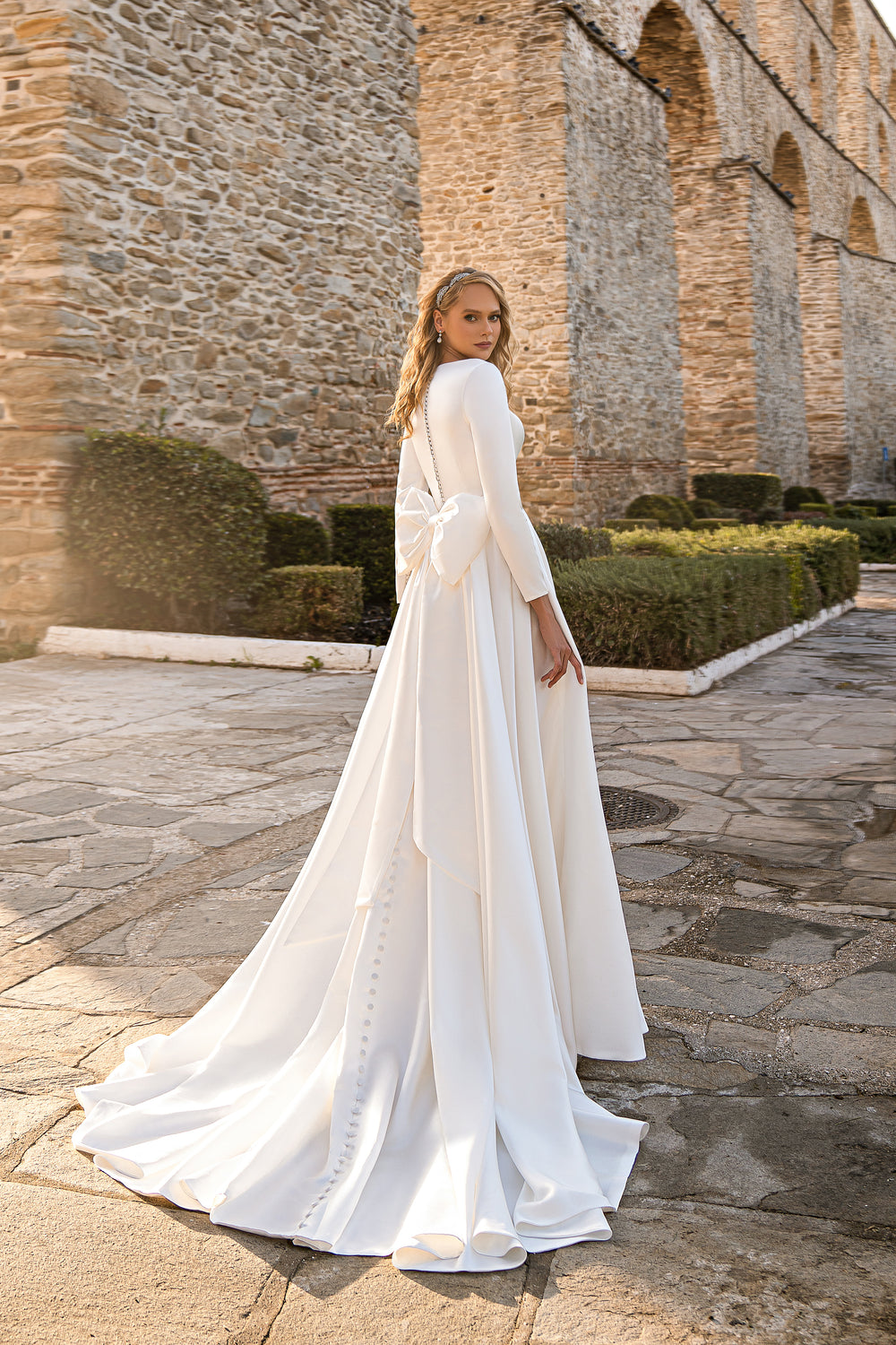 Ivory Satin Wedding Dress with Long Sleeves, Buttons, and Removable Bow