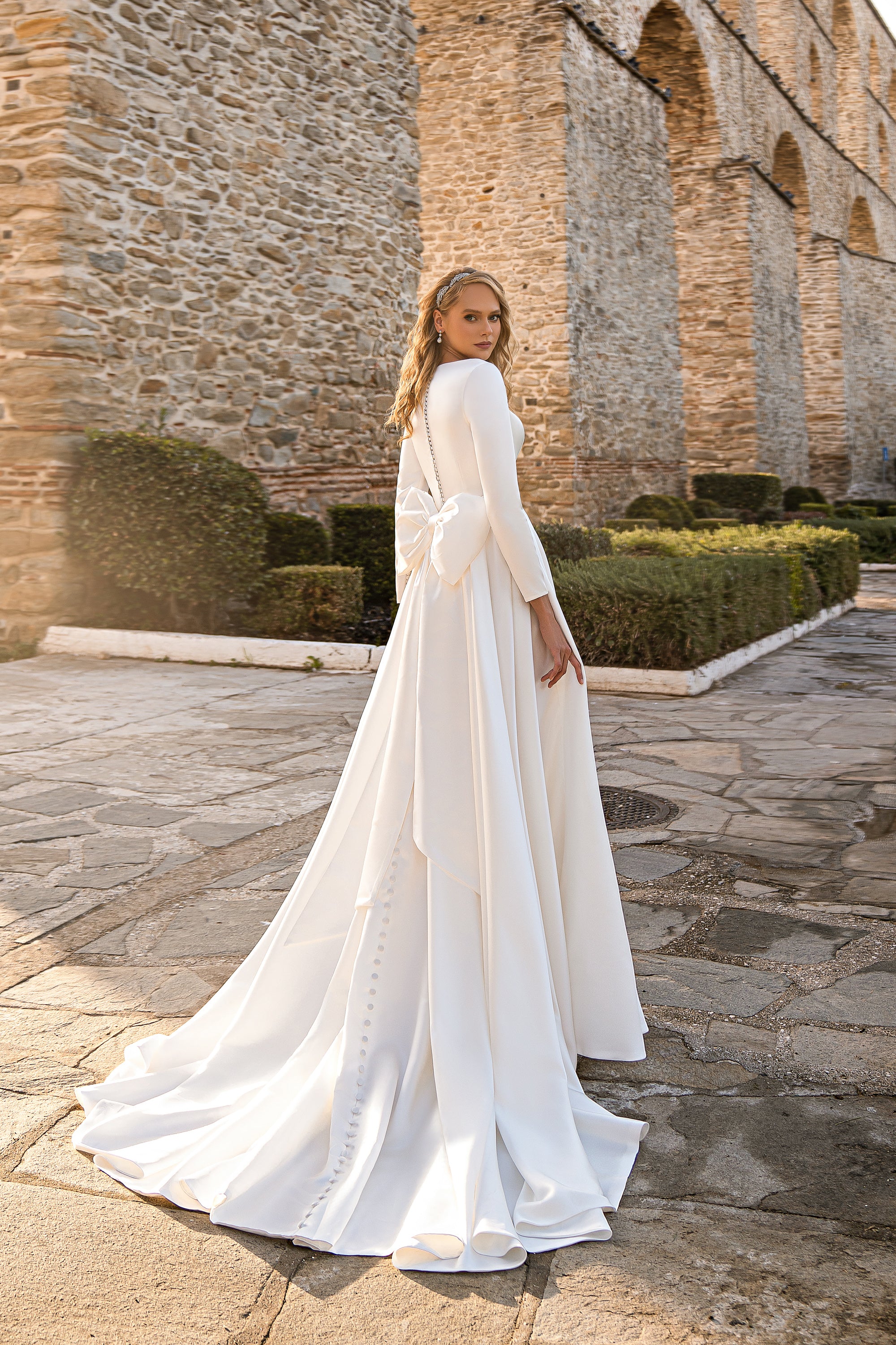 Ivory Satin Wedding Dress with Long Sleeves, Buttons, and Removable Bow