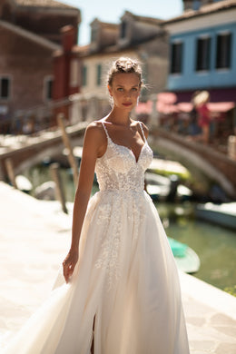 Elegant A-Line Wedding Dress with Slit Tulle Skirt, Lace Back with Buttons, Spaghetti Straps, and Detachable Cape