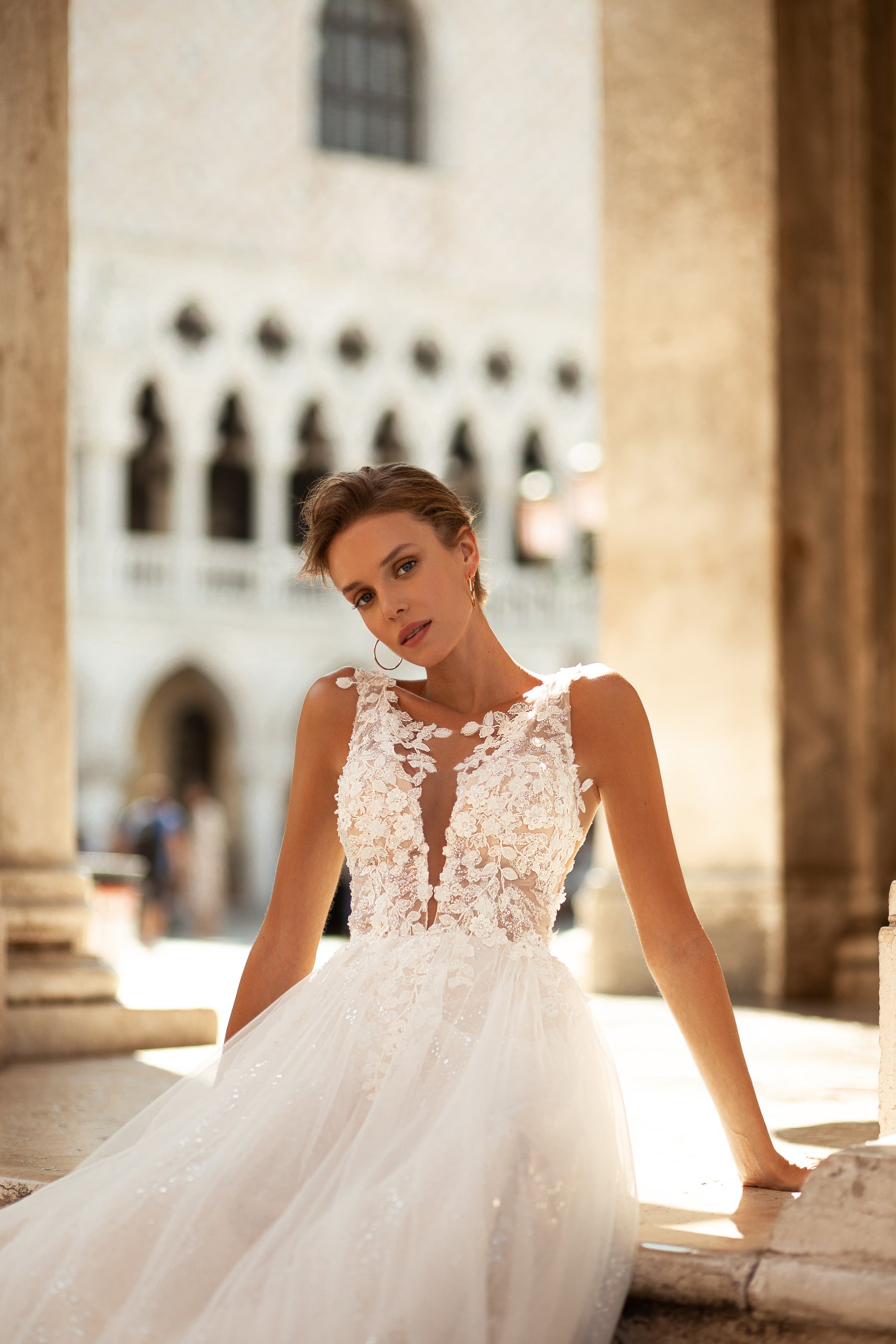A-Line Bridal Gown with Light Tulle, Deep V-Neck, Straps, Low Back, Lace at the Top, and Sparkling Skirt