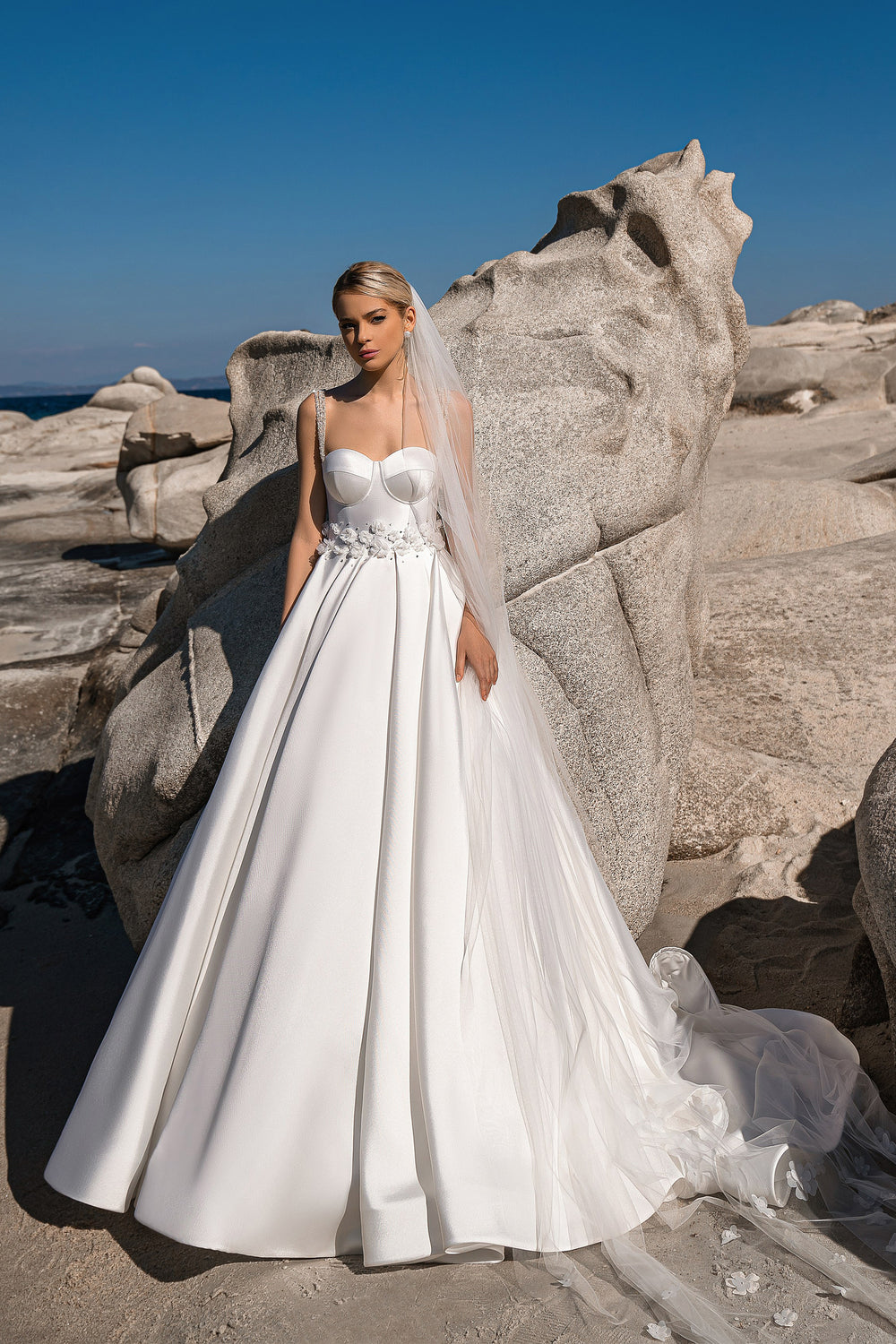Elegant A-Line Satin Wedding Dress with Spaghetti Straps and Sleeveless Design