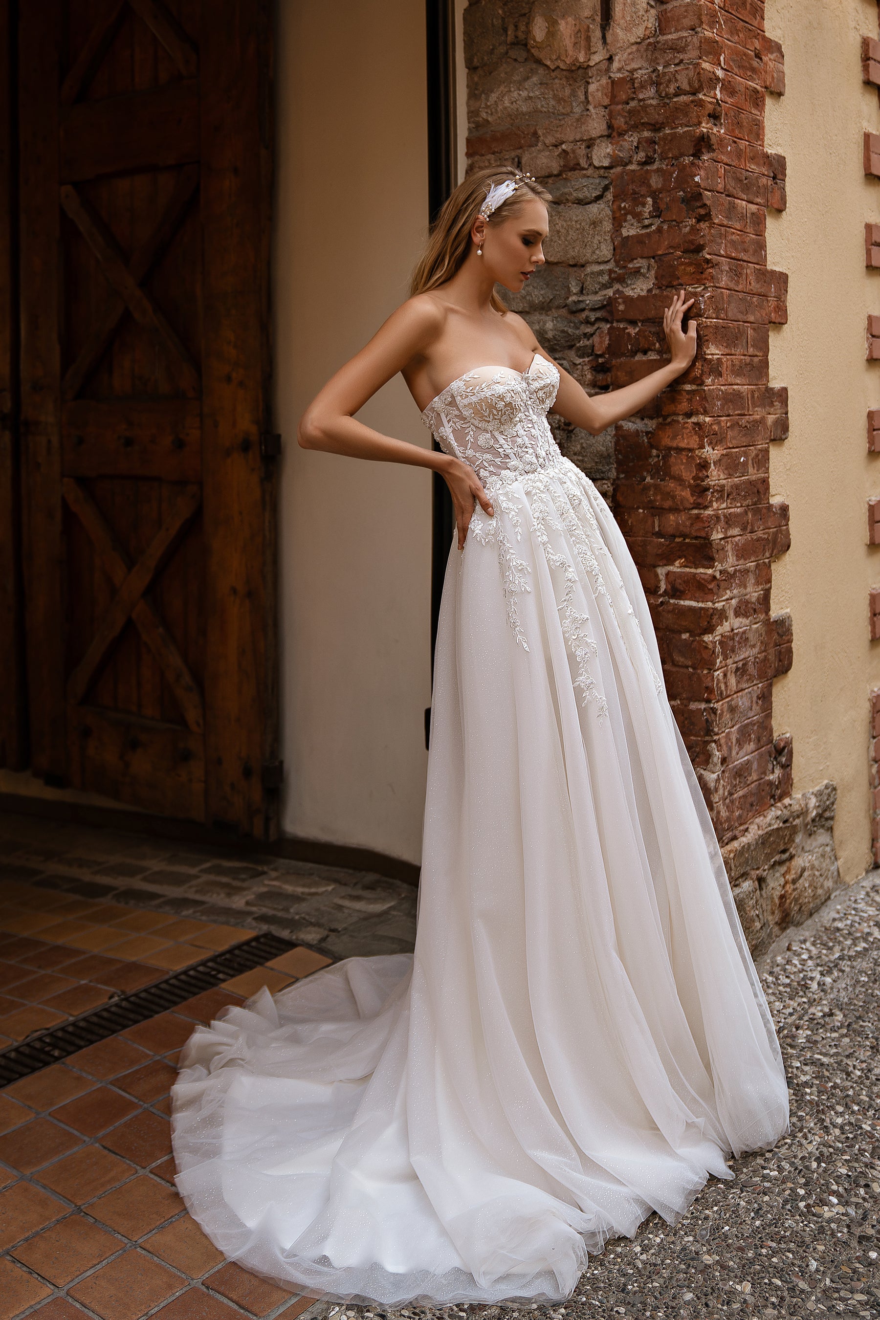 Modern Off-the-Shoulder Wedding Dress with Embroidered Floral Appliqués, Glitter Layers, and Lacing at the Back