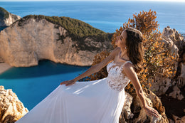 Exquisite Wedding Dress with Asymmetrical Corset, Soft Skirt, and Multi-Chiffon Train, Decorated with Floral Chantelle Appliques, Beads, Pearls, and Sequins, with Removable Element
