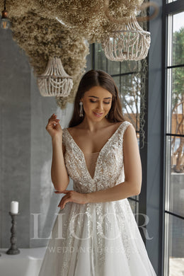 A-Line Wedding Dress With Beaded Lace Bodice, V-Neck, Sleeveless, Tulle Skirt, Lace Appliqués, Beading
