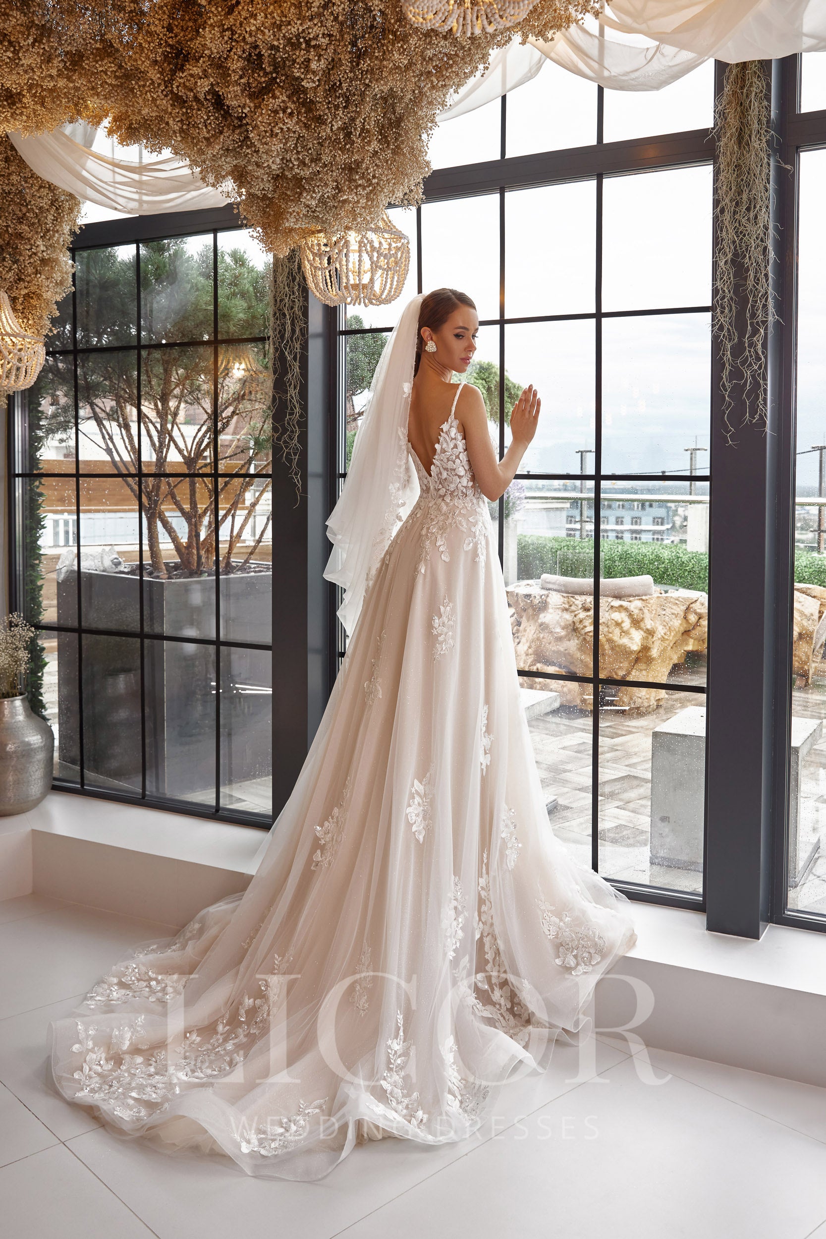 Romantic A-Line Wedding Dress with Tulle, Lace Appliqués, Sweetheart Neckline, Illusion Long Sleeves, Cathedral Train