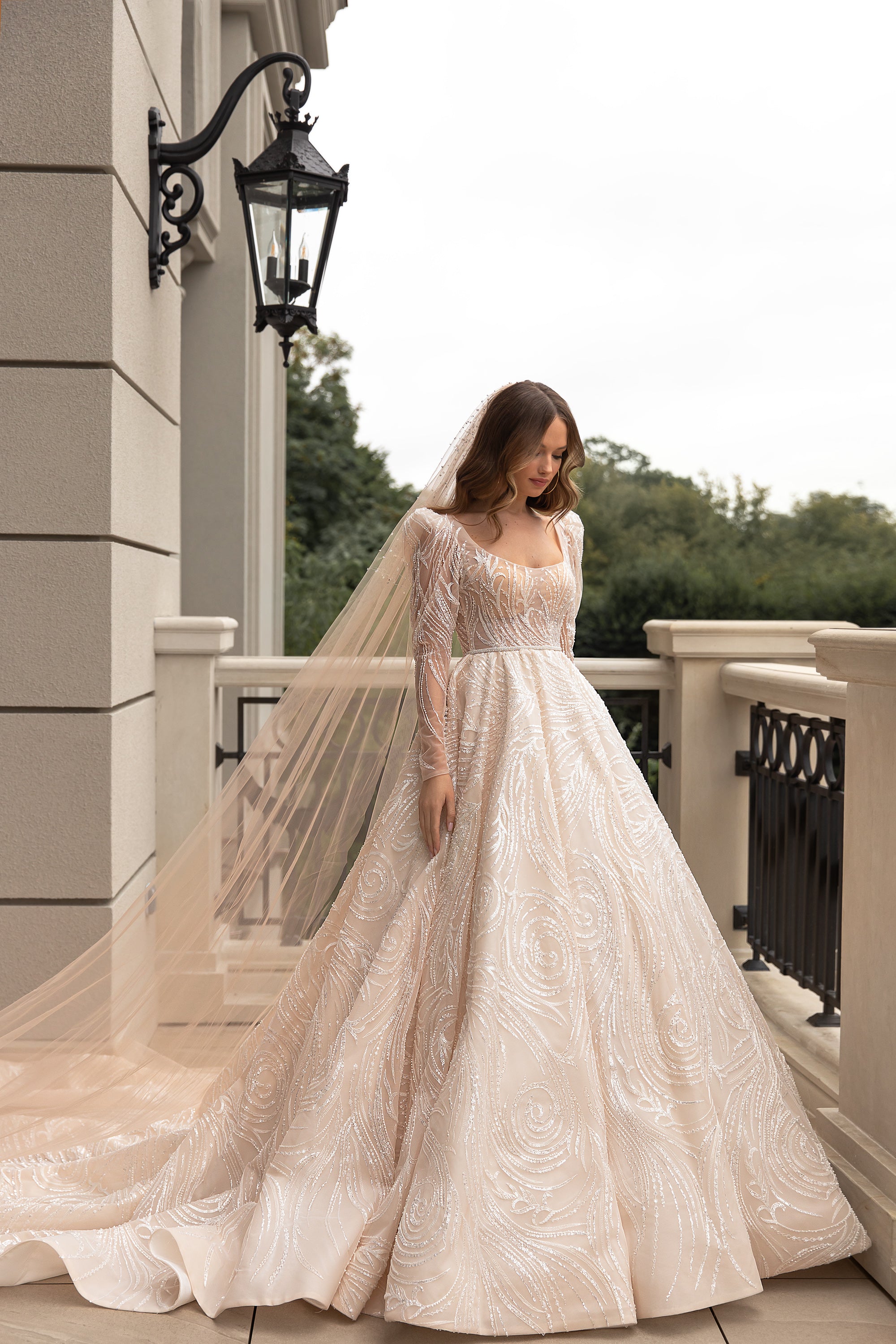 Elegant Wedding Gown with Boat Neckline, A-Line Silhouette, and Long Sleeves