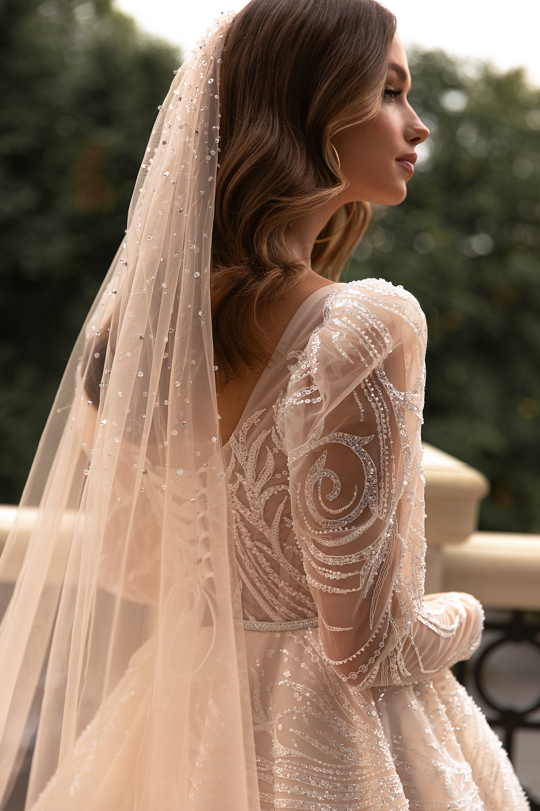 Elegant Wedding Gown with Boat Neckline, A-Line Silhouette, and Long Sleeves
