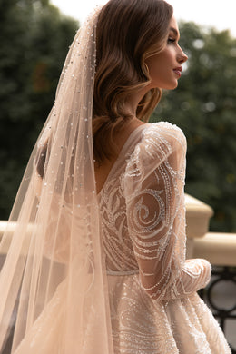 Elegant Wedding Gown with Boat Neckline, A-Line Silhouette, and Long Sleeves