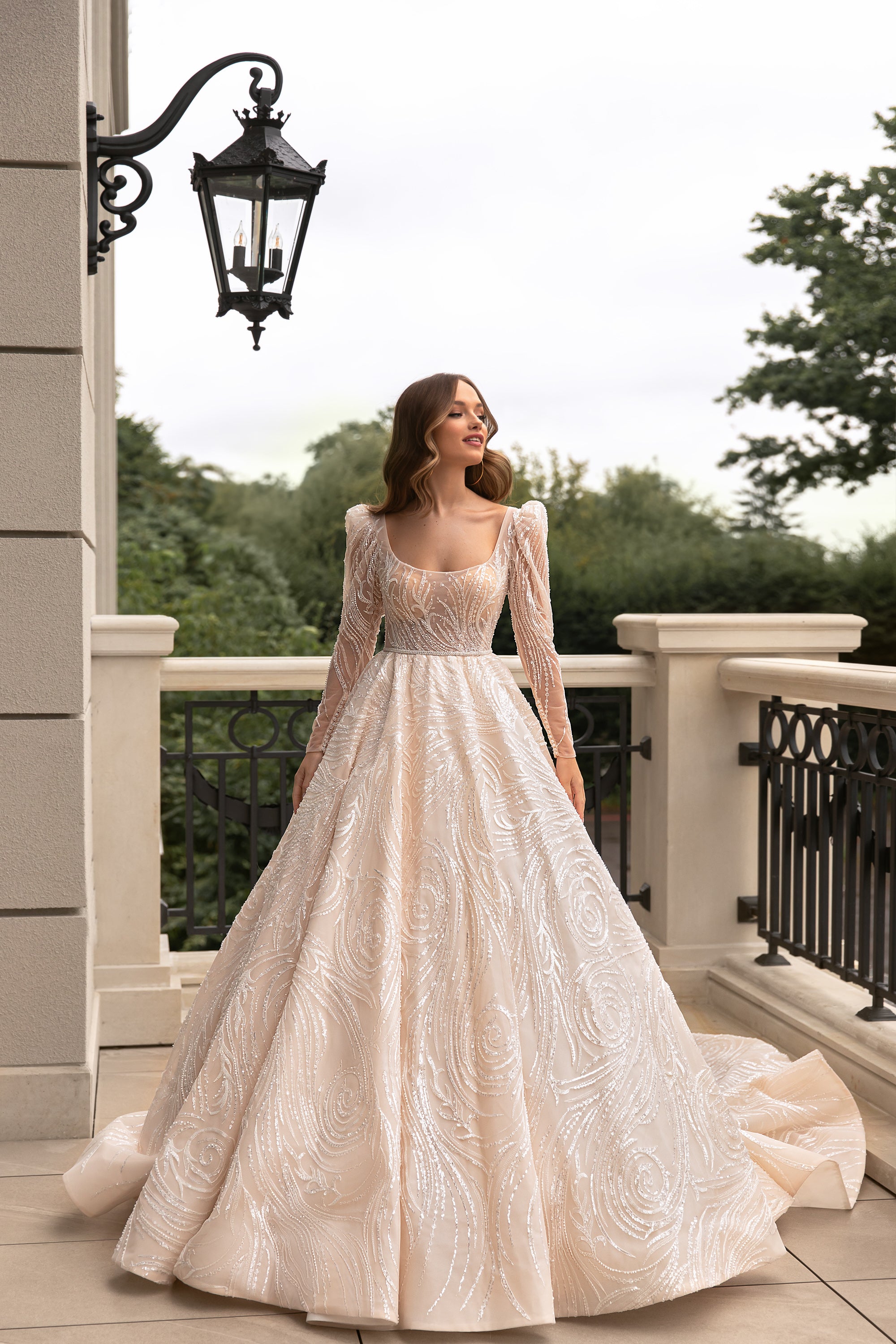 Elegant Wedding Gown with Boat Neckline, A-Line Silhouette, and Long Sleeves