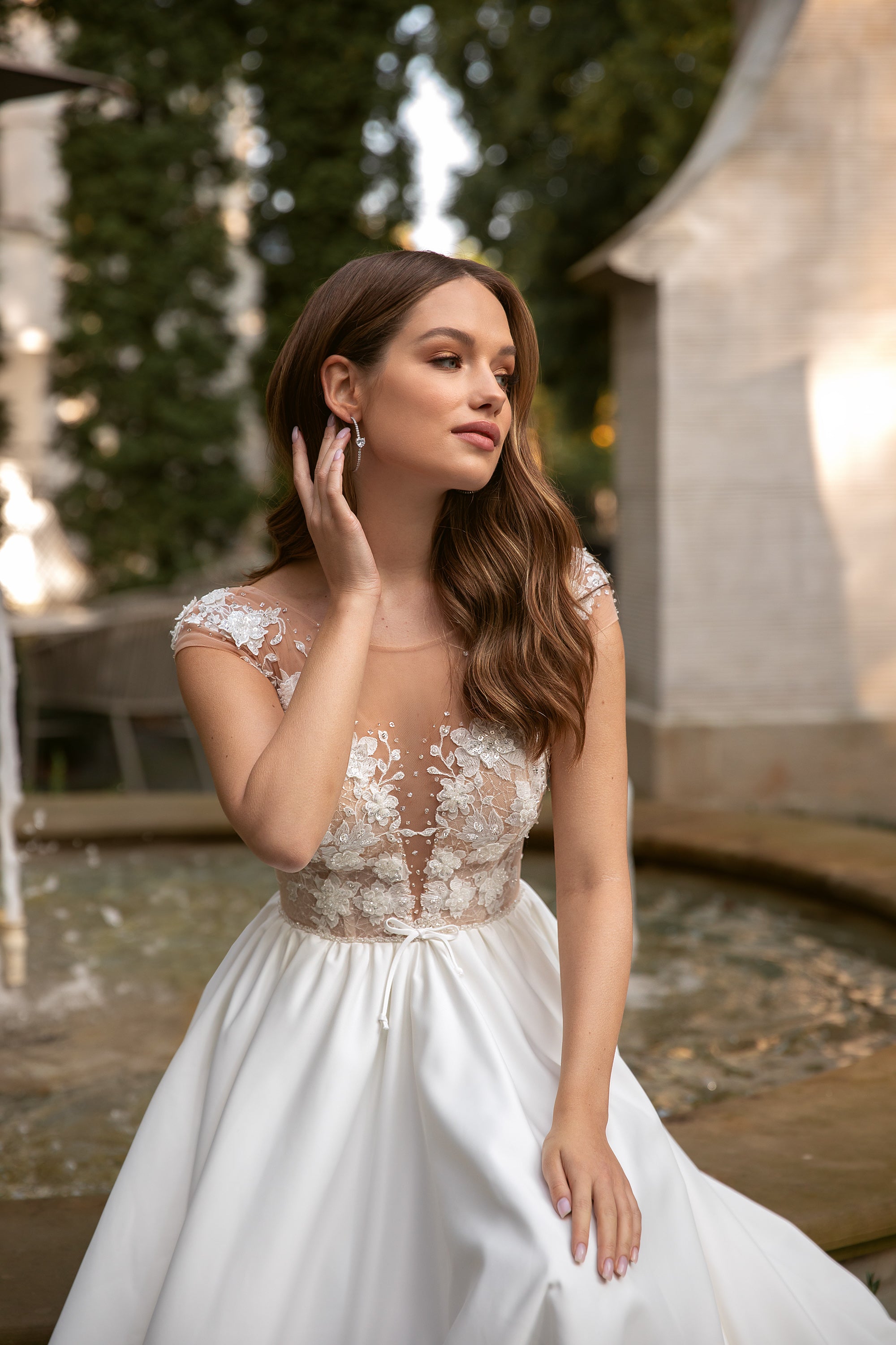 A-Line Deep V-Neck Satin Bridal Dress with Lace and Buttons Along Skirt
