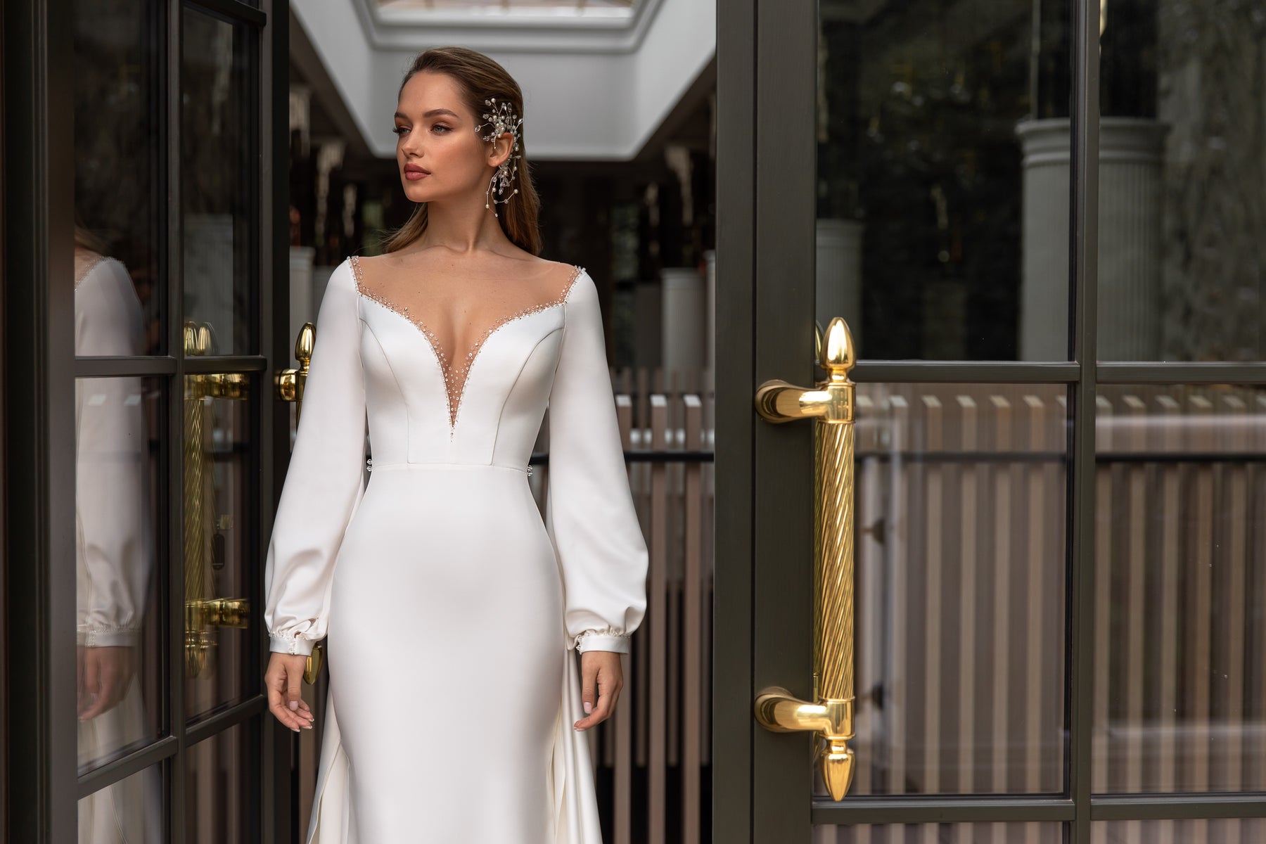 Elegant Fit-and-Flare Bridal Dress with Deep V-Neck, Beaded V-Neck, Long Sleeve, and Buttons at the Back