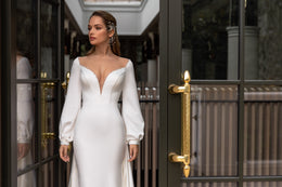 Elegant Fit-and-Flare Bridal Dress with Deep V-Neck, Beaded V-Neck, Long Sleeve, and Buttons at the Back