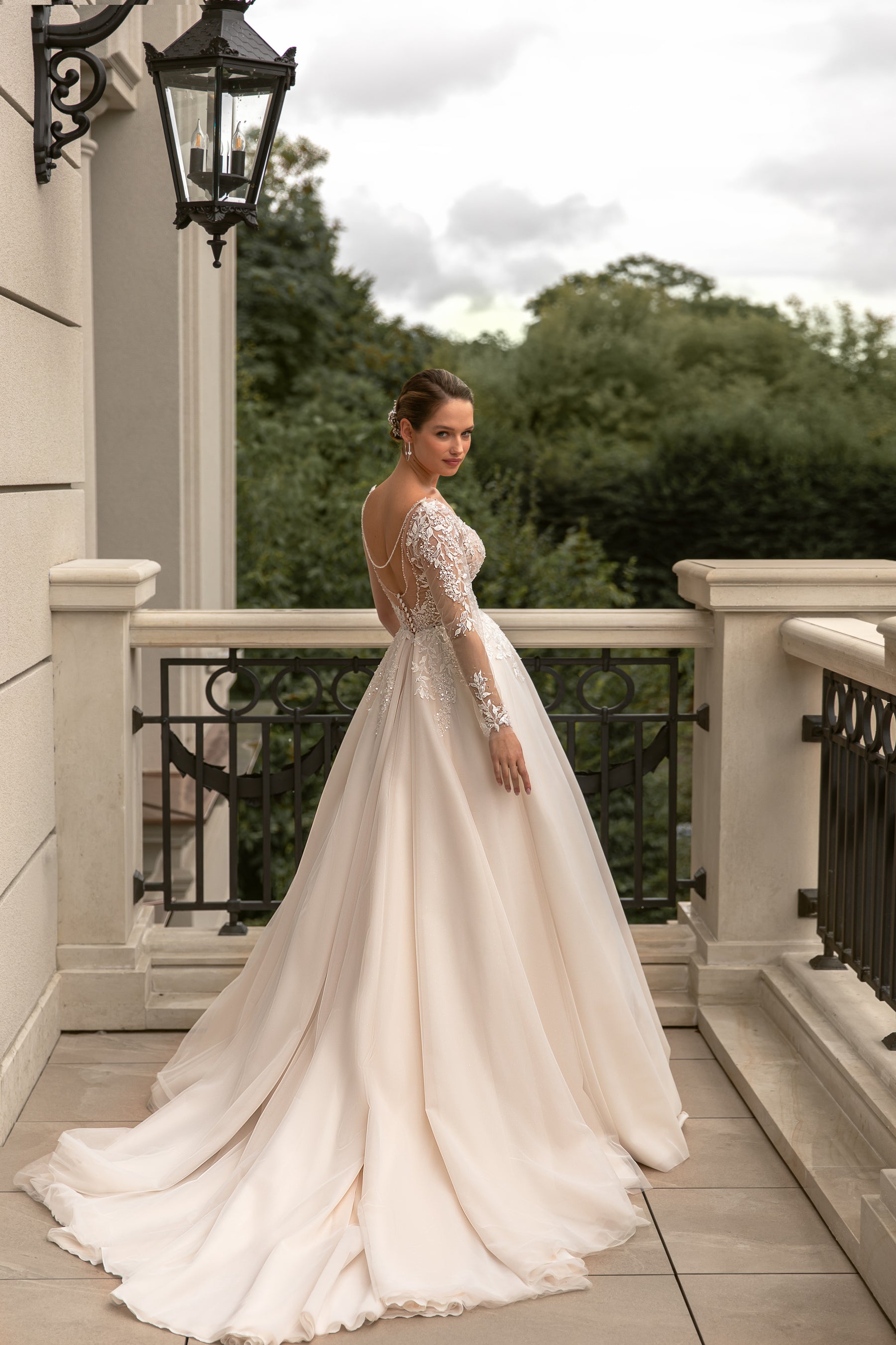 A-Line Deep V-Neck Bridal Dress with Tulle, Decorated Back, Long Sleeves, and Lace Top