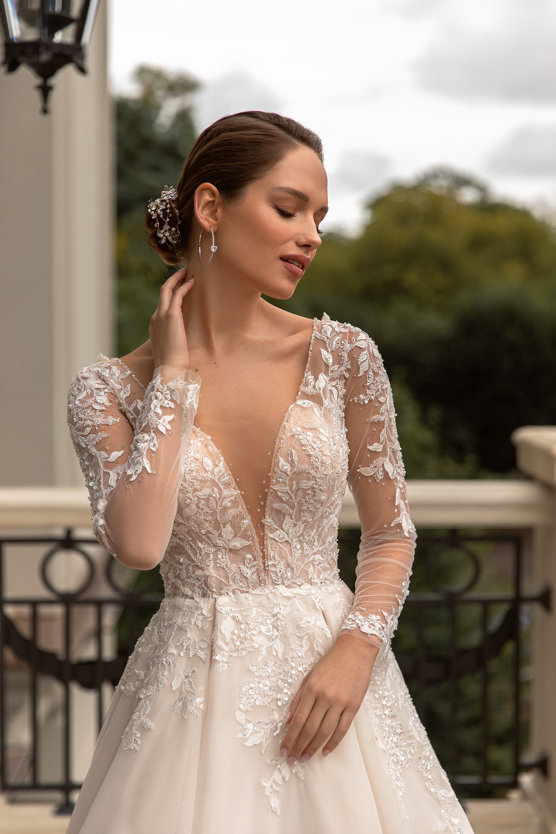 A-Line Deep V-Neck Bridal Dress with Tulle, Decorated Back, Long Sleeves, and Lace Top