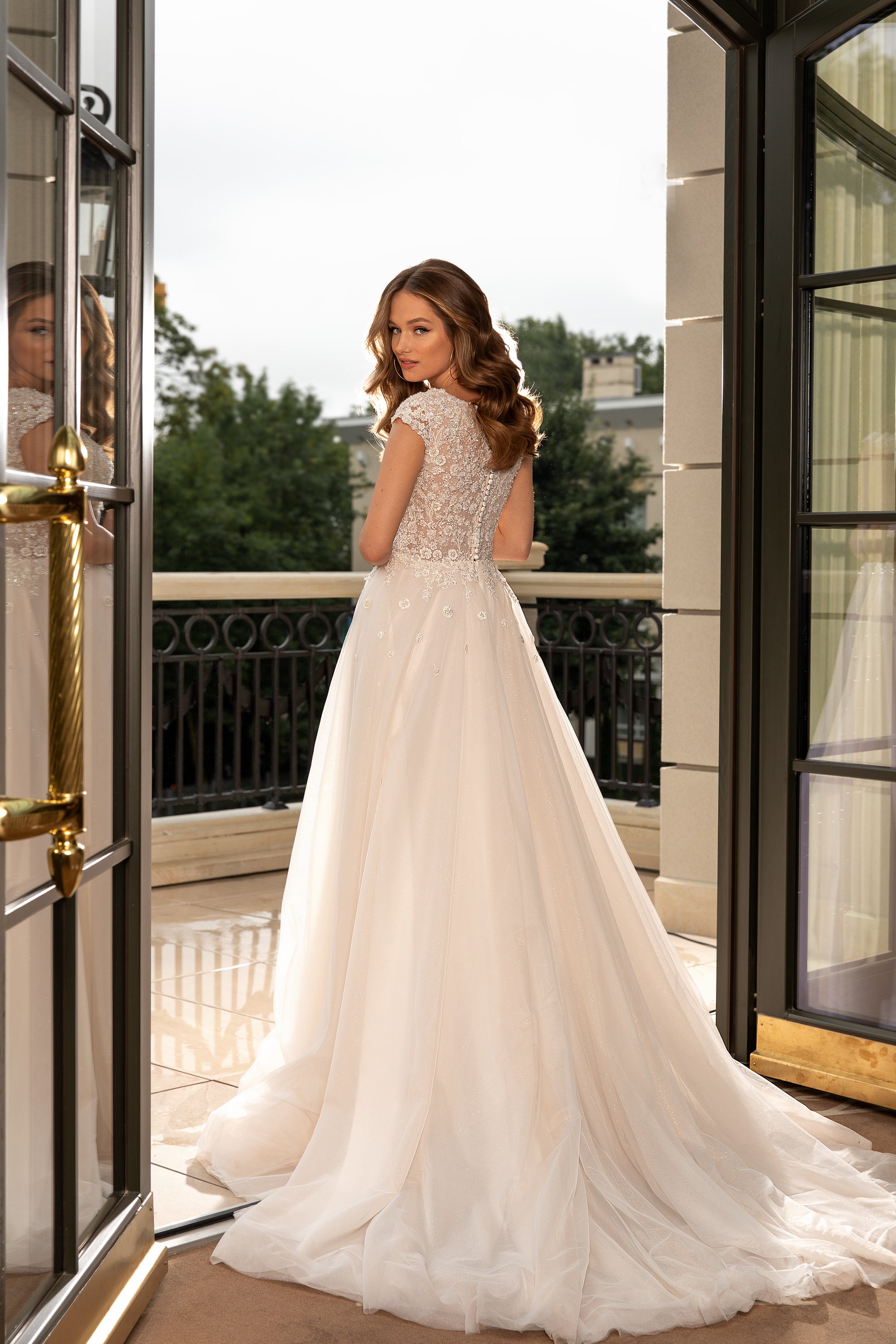 Elegant Bridal Gown with Minimalist Deep V-Neck, Closed Lace Back and Buttons Back