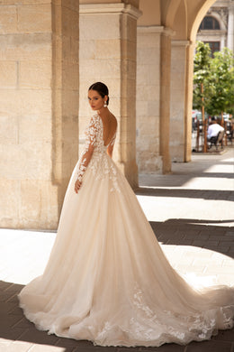Elegant Wedding Gown with Deep V-Neck, Ballgown Silhouette, Lace Top, Tulle Skirt, and Long Lace Sleeves